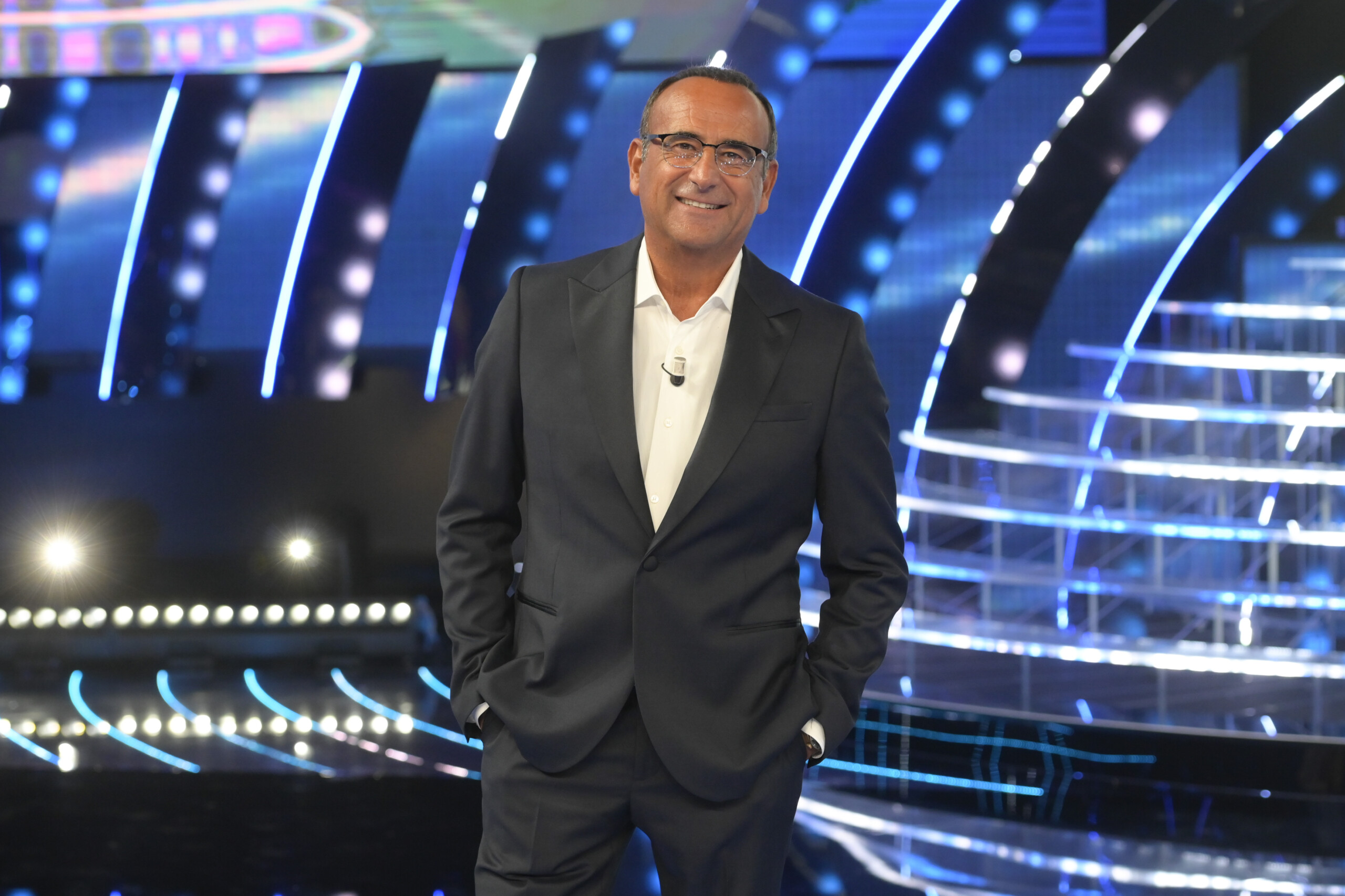 sanremo conti among the co hosts bianca balti and malgioglio scaled