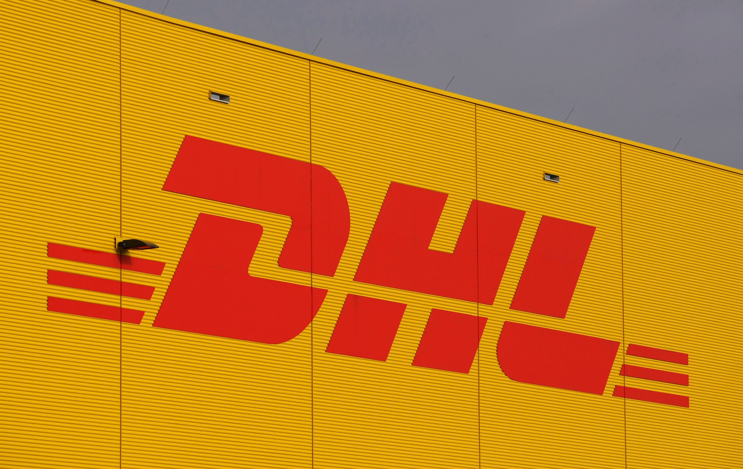 milan exploitation in dhl contracts e46 8 million seized from multinational