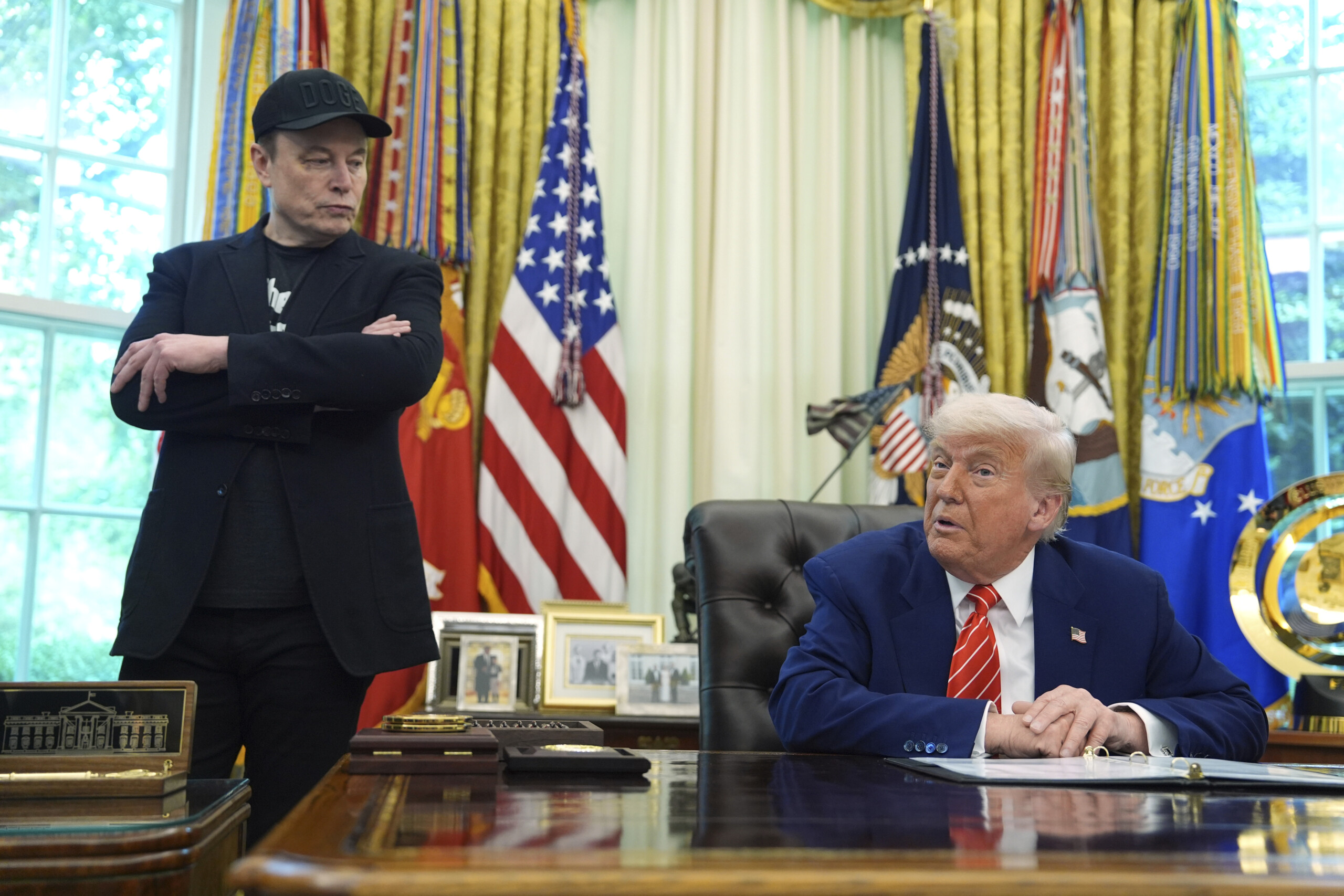 us trump we will review all of musks contracts with the government scaled