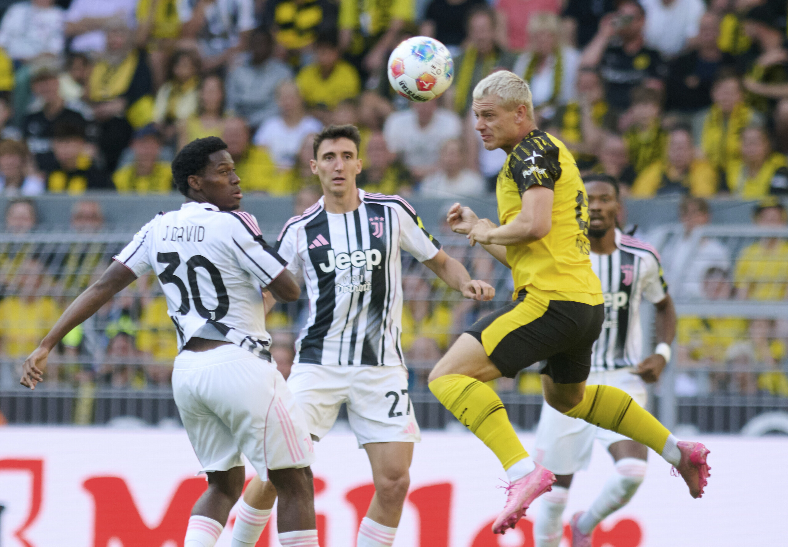 juventus beats borussia dortmund 2 1 with a brace from cambiaso scaled
