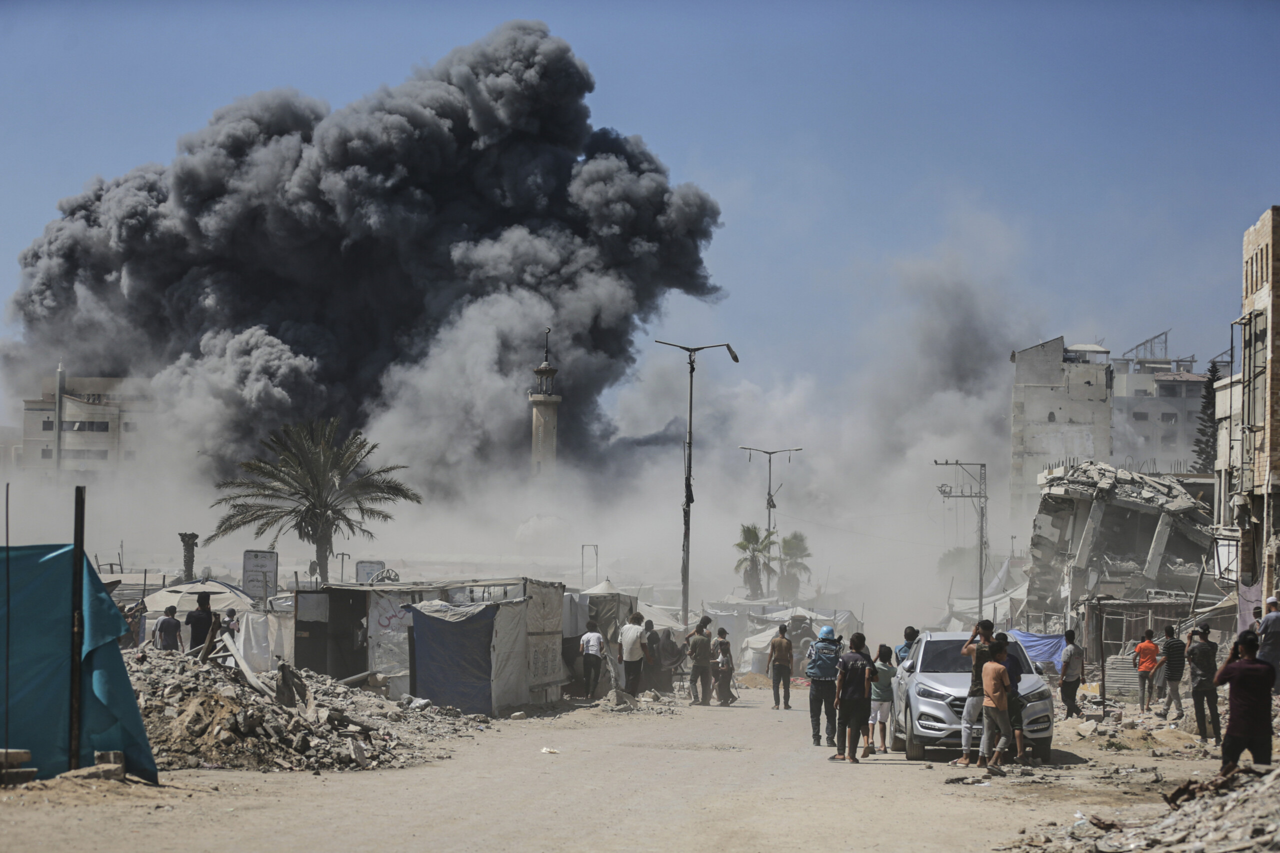 middle east idf attack razes building in gaza city scaled