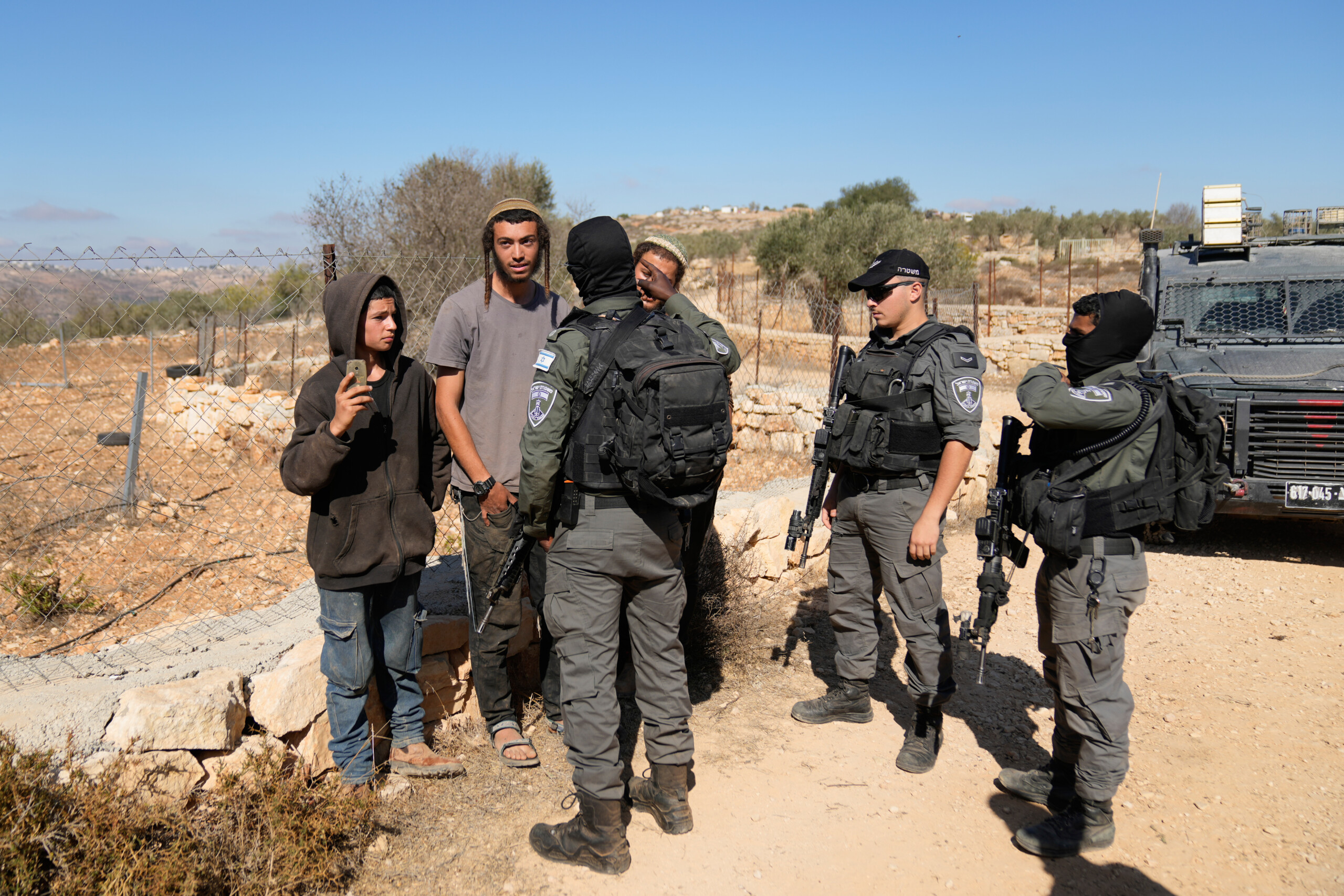 middle east masked settlers attack two villages in the west bank scaled