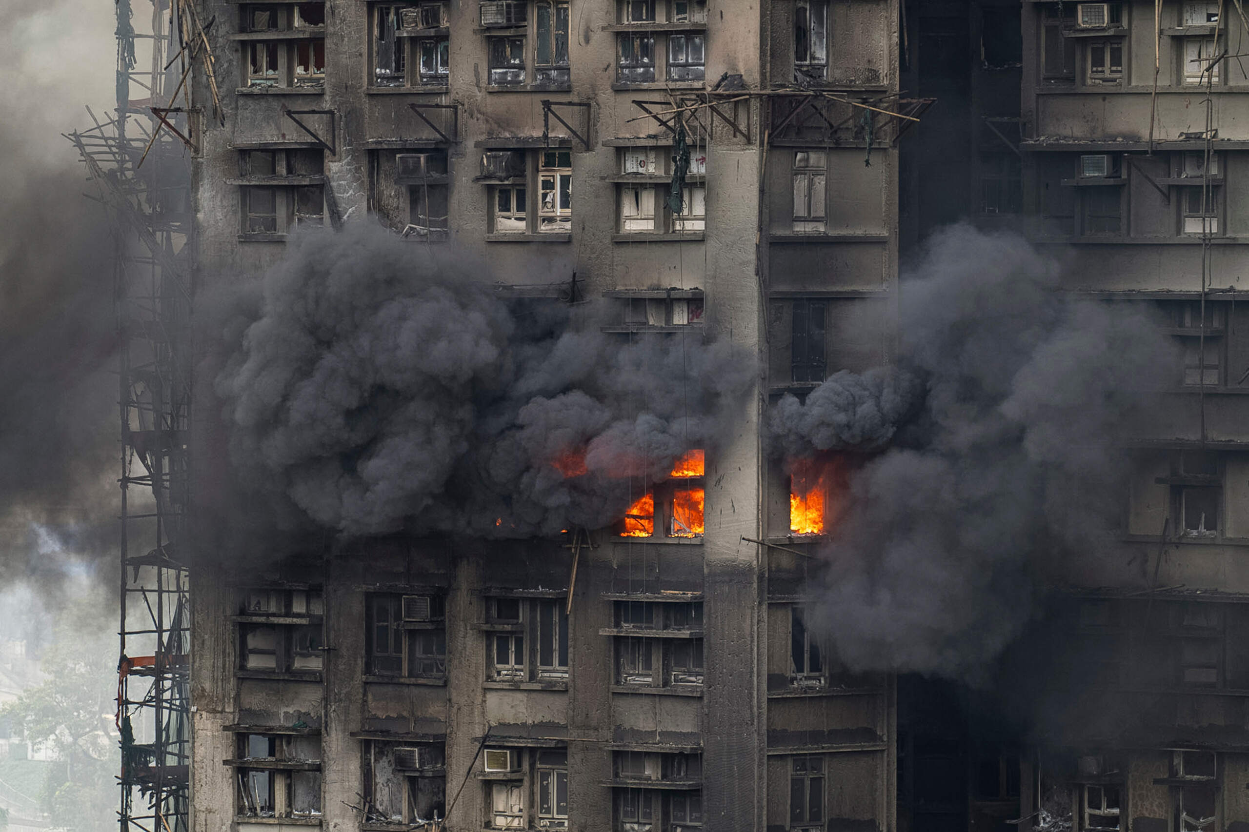 hong kong skyscraper fire death toll rises to 65 scaled
