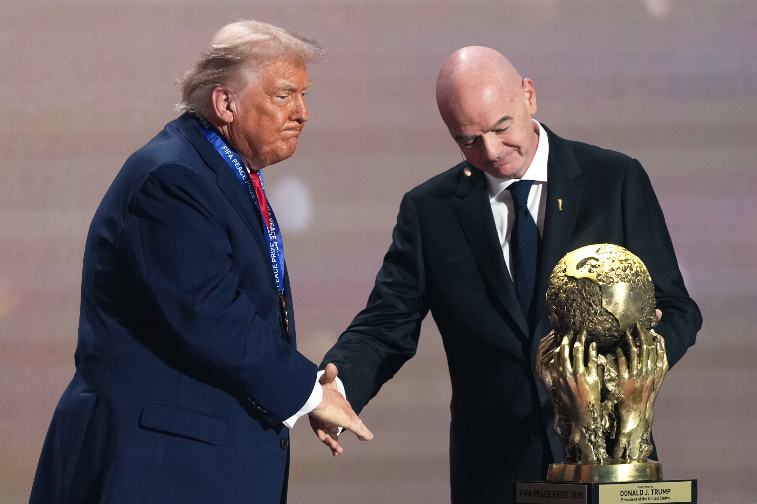 usa infantino presents trump with the fifa peace prize scaled