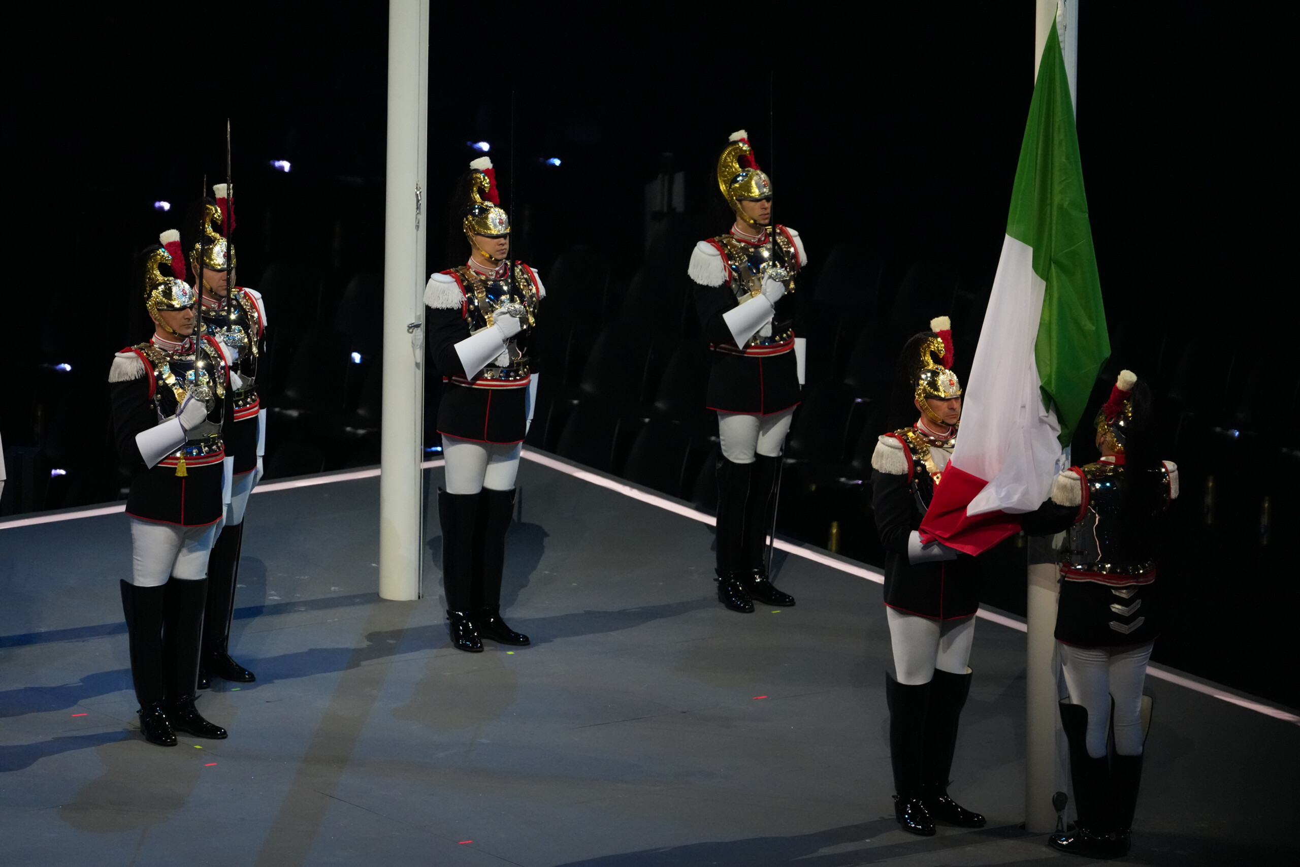 milan cortina cheers for mattarella in the stands during ceremony alongside ioc president scaled